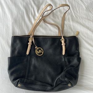 Black leather Michael Kors tote purse with zipper